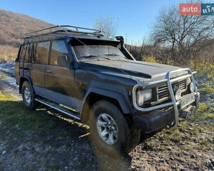 Черный Ниссан Патрол, объемом двигателя 2.8 л и пробегом 300 тыс. км за 5250 $, фото 1 на Automoto.ua