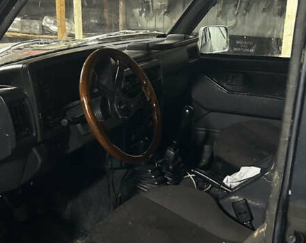 Черный Ниссан Патрол, объемом двигателя 0 л и пробегом 300 тыс. км за 7200 $, фото 2 на Automoto.ua