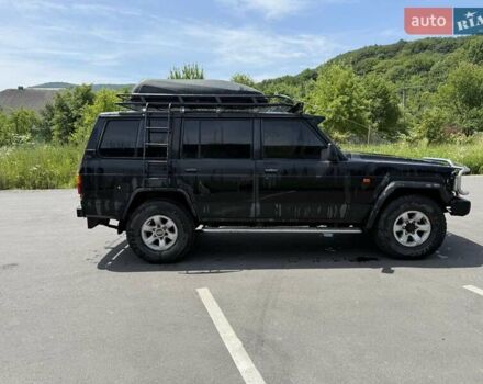Черный Ниссан Патрол, объемом двигателя 2.8 л и пробегом 300 тыс. км за 6250 $, фото 1 на Automoto.ua