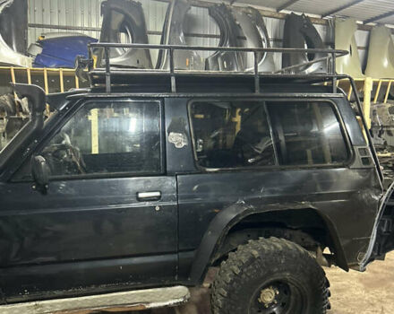 Черный Ниссан Патрол, объемом двигателя 0 л и пробегом 300 тыс. км за 7200 $, фото 11 на Automoto.ua