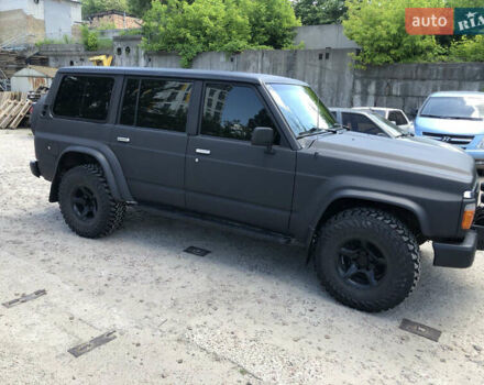 Черный Ниссан Патрол, объемом двигателя 4.2 л и пробегом 310 тыс. км за 18500 $, фото 4 на Automoto.ua