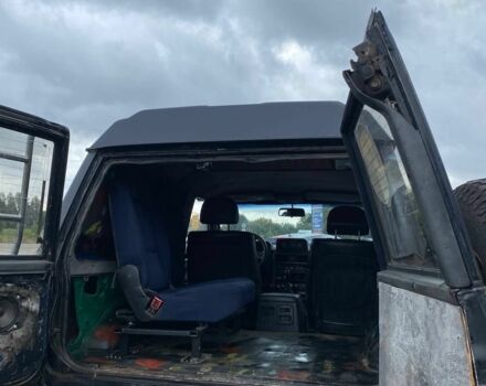 Чорний Ніссан Патрол, об'ємом двигуна 0 л та пробігом 250 тис. км за 5600 $, фото 2 на Automoto.ua