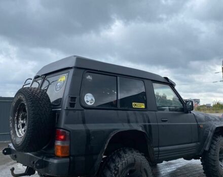 Чорний Ніссан Патрол, об'ємом двигуна 0 л та пробігом 250 тис. км за 7500 $, фото 1 на Automoto.ua