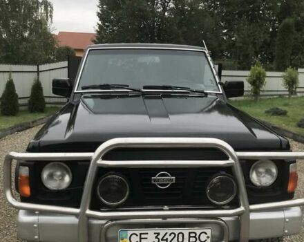 Чорний Ніссан Патрол, об'ємом двигуна 2.8 л та пробігом 306 тис. км за 12000 $, фото 4 на Automoto.ua