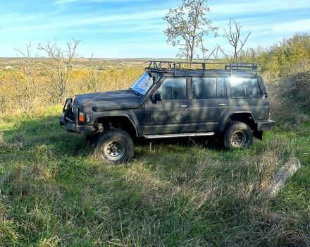 Чорний Ніссан Патрол, об'ємом двигуна 4.2 л та пробігом 0 тис. км за 7500 $, фото 1 на Automoto.ua
