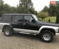Чорний Ніссан Патрол, об'ємом двигуна 2.8 л та пробігом 306 тис. км за 12000 $, фото 1 на Automoto.ua