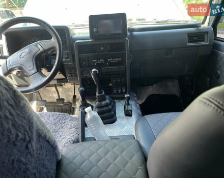 Чорний Ніссан Патрол, об'ємом двигуна 4.16 л та пробігом 315 тис. км за 12000 $, фото 8 на Automoto.ua
