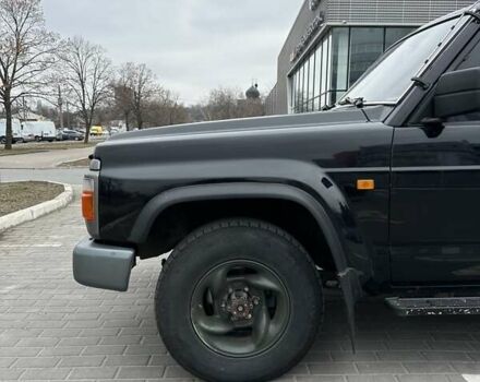 Чорний Ніссан Патрол, об'ємом двигуна 3 л та пробігом 200 тис. км за 12499 $, фото 12 на Automoto.ua