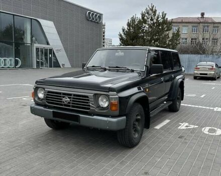 Черный Ниссан Патрол, объемом двигателя 3 л и пробегом 200 тыс. км за 10999 $, фото 1 на Automoto.ua