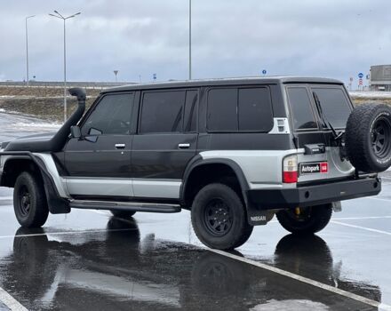 Чорний Ніссан Патрол, об'ємом двигуна 4.2 л та пробігом 330 тис. км за 13490 $, фото 25 на Automoto.ua