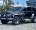 Чорний Ніссан Патрол, об'ємом двигуна 2.8 л та пробігом 415 тис. км за 12500 $, фото 1 на Automoto.ua