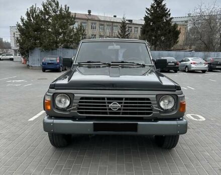 Черный Ниссан Патрол, объемом двигателя 3 л и пробегом 200 тыс. км за 10999 $, фото 4 на Automoto.ua