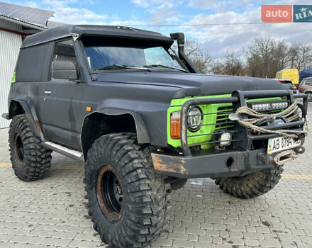 Черный Ниссан Патрол, объемом двигателя 2.8 л и пробегом 300 тыс. км за 12000 $, фото 13 на Automoto.ua