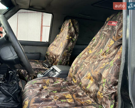 Черный Ниссан Патрол, объемом двигателя 2.8 л и пробегом 300 тыс. км за 12000 $, фото 30 на Automoto.ua