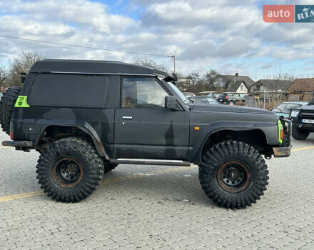 Черный Ниссан Патрол, объемом двигателя 2.8 л и пробегом 300 тыс. км за 12000 $, фото 15 на Automoto.ua