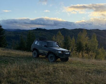 Черный Ниссан Патрол, объемом двигателя 2.8 л и пробегом 306 тыс. км за 15000 $, фото 12 на Automoto.ua