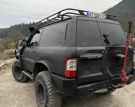 Чорний Ніссан Патрол, об'ємом двигуна 2.83 л та пробігом 307 тис. км за 14800 $, фото 5 на Automoto.ua