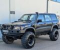 Черный Ниссан Патрол, объемом двигателя 2.8 л и пробегом 133 тыс. км за 2700 $, фото 1 на Automoto.ua