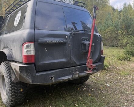 Черный Ниссан Патрол, объемом двигателя 2.8 л и пробегом 306 тыс. км за 15000 $, фото 7 на Automoto.ua