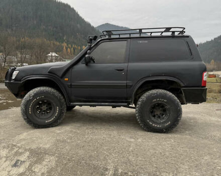 Чорний Ніссан Патрол, об'ємом двигуна 2.83 л та пробігом 307 тис. км за 14800 $, фото 6 на Automoto.ua