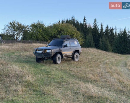 Черный Ниссан Патрол, объемом двигателя 2.83 л и пробегом 307 тыс. км за 15000 $, фото 9 на Automoto.ua