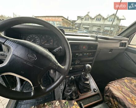 Черный Ниссан Патрол, объемом двигателя 2.8 л и пробегом 300 тыс. км за 12000 $, фото 32 на Automoto.ua