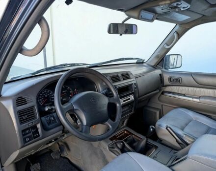 Черный Ниссан Патрол, объемом двигателя 2.8 л и пробегом 133 тыс. км за 2700 $, фото 4 на Automoto.ua