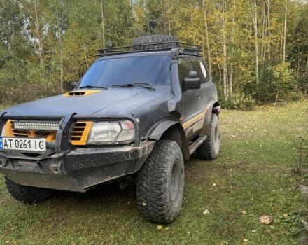 Черный Ниссан Патрол, объемом двигателя 2.8 л и пробегом 306 тыс. км за 15000 $, фото 4 на Automoto.ua