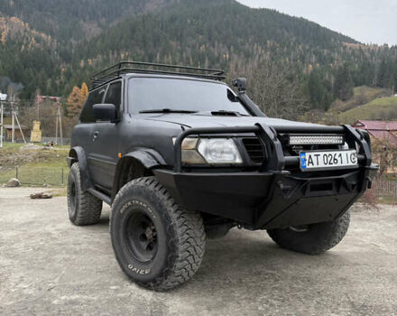 Чорний Ніссан Патрол, об'ємом двигуна 2.83 л та пробігом 307 тис. км за 14800 $, фото 3 на Automoto.ua