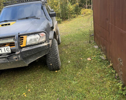 Черный Ниссан Патрол, объемом двигателя 2.83 л и пробегом 307 тыс. км за 15000 $, фото 1 на Automoto.ua