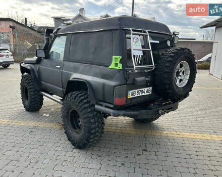 Черный Ниссан Патрол, объемом двигателя 2.8 л и пробегом 300 тыс. км за 12000 $, фото 26 на Automoto.ua