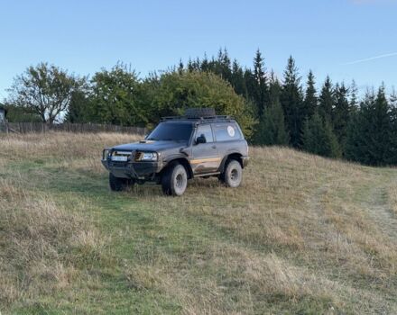 Черный Ниссан Патрол, объемом двигателя 2.8 л и пробегом 306 тыс. км за 15000 $, фото 13 на Automoto.ua