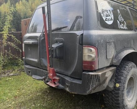 Черный Ниссан Патрол, объемом двигателя 2.8 л и пробегом 306 тыс. км за 15000 $, фото 6 на Automoto.ua