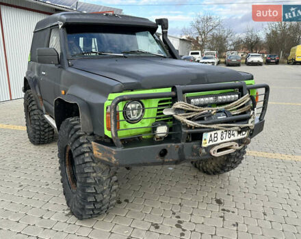 Черный Ниссан Патрол, объемом двигателя 2.8 л и пробегом 300 тыс. км за 12000 $, фото 10 на Automoto.ua