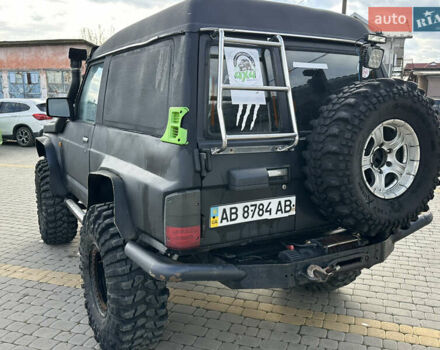 Черный Ниссан Патрол, объемом двигателя 2.8 л и пробегом 300 тыс. км за 12000 $, фото 22 на Automoto.ua