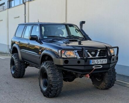 Черный Ниссан Патрол, объемом двигателя 2.8 л и пробегом 133 тыс. км за 2700 $, фото 2 на Automoto.ua