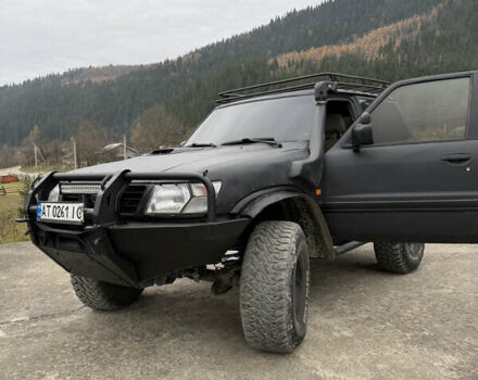 Чорний Ніссан Патрол, об'ємом двигуна 2.83 л та пробігом 307 тис. км за 14800 $, фото 10 на Automoto.ua