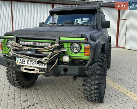 Черный Ниссан Патрол, объемом двигателя 2.8 л и пробегом 300 тыс. км за 12000 $, фото 5 на Automoto.ua