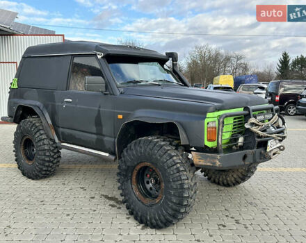 Черный Ниссан Патрол, объемом двигателя 2.8 л и пробегом 300 тыс. км за 12000 $, фото 14 на Automoto.ua