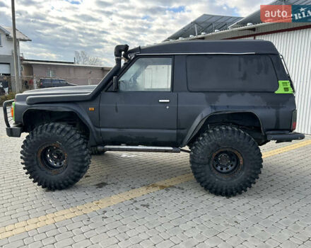 Черный Ниссан Патрол, объемом двигателя 2.8 л и пробегом 300 тыс. км за 12000 $, фото 28 на Automoto.ua