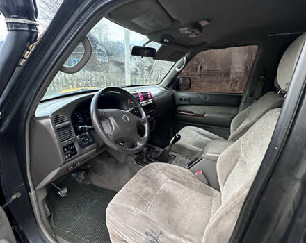 Черный Ниссан Патрол, объемом двигателя 2.83 л и пробегом 307 тыс. км за 15000 $, фото 14 на Automoto.ua