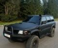 Черный Ниссан Патрол, объемом двигателя 2.95 л и пробегом 340 тыс. км за 10500 $, фото 1 на Automoto.ua