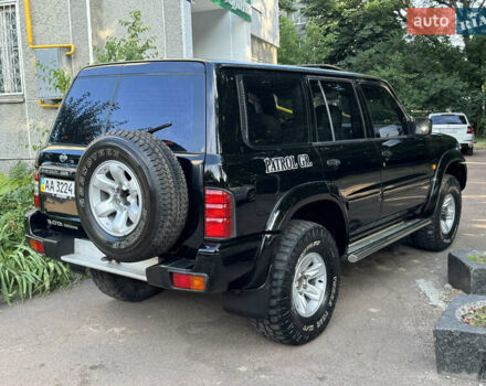 Чорний Ніссан Патрол, об'ємом двигуна 2.95 л та пробігом 400 тис. км за 13750 $, фото 12 на Automoto.ua