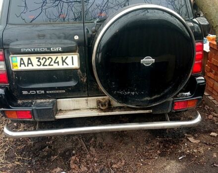 Черный Ниссан Патрол, объемом двигателя 3 л и пробегом 230 тыс. км за 11000 $, фото 1 на Automoto.ua