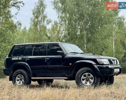 Черный Ниссан Патрол, объемом двигателя 3 л и пробегом 390 тыс. км за 11750 $, фото 5 на Automoto.ua