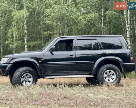 Черный Ниссан Патрол, объемом двигателя 3 л и пробегом 390 тыс. км за 11750 $, фото 15 на Automoto.ua