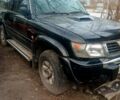 Черный Ниссан Патрол, объемом двигателя 3 л и пробегом 230 тыс. км за 11000 $, фото 4 на Automoto.ua