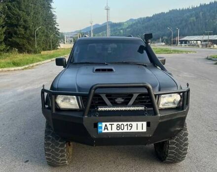 Черный Ниссан Патрол, объемом двигателя 2.95 л и пробегом 340 тыс. км за 10500 $, фото 8 на Automoto.ua
