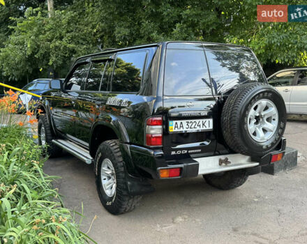 Чорний Ніссан Патрол, об'ємом двигуна 2.95 л та пробігом 400 тис. км за 13750 $, фото 10 на Automoto.ua
