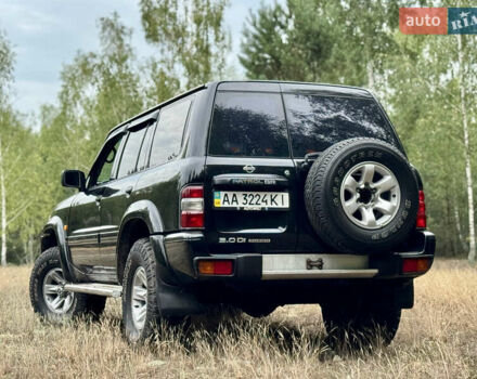 Черный Ниссан Патрол, объемом двигателя 3 л и пробегом 390 тыс. км за 11750 $, фото 2 на Automoto.ua